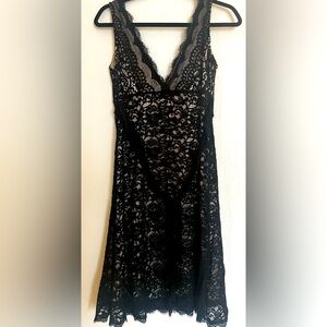 Black lace mid calf dress with waist tie and v front and back.